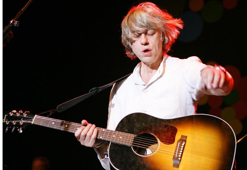 s:75:"Bob Geldof war Initiator der "Live Aid"-Konzerte in London und Philadelphia";