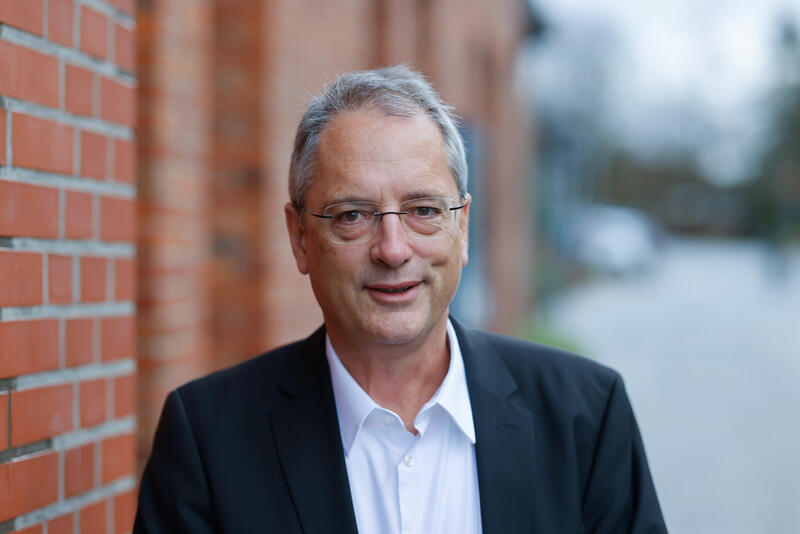 s:13:"Ulf Schlüter";